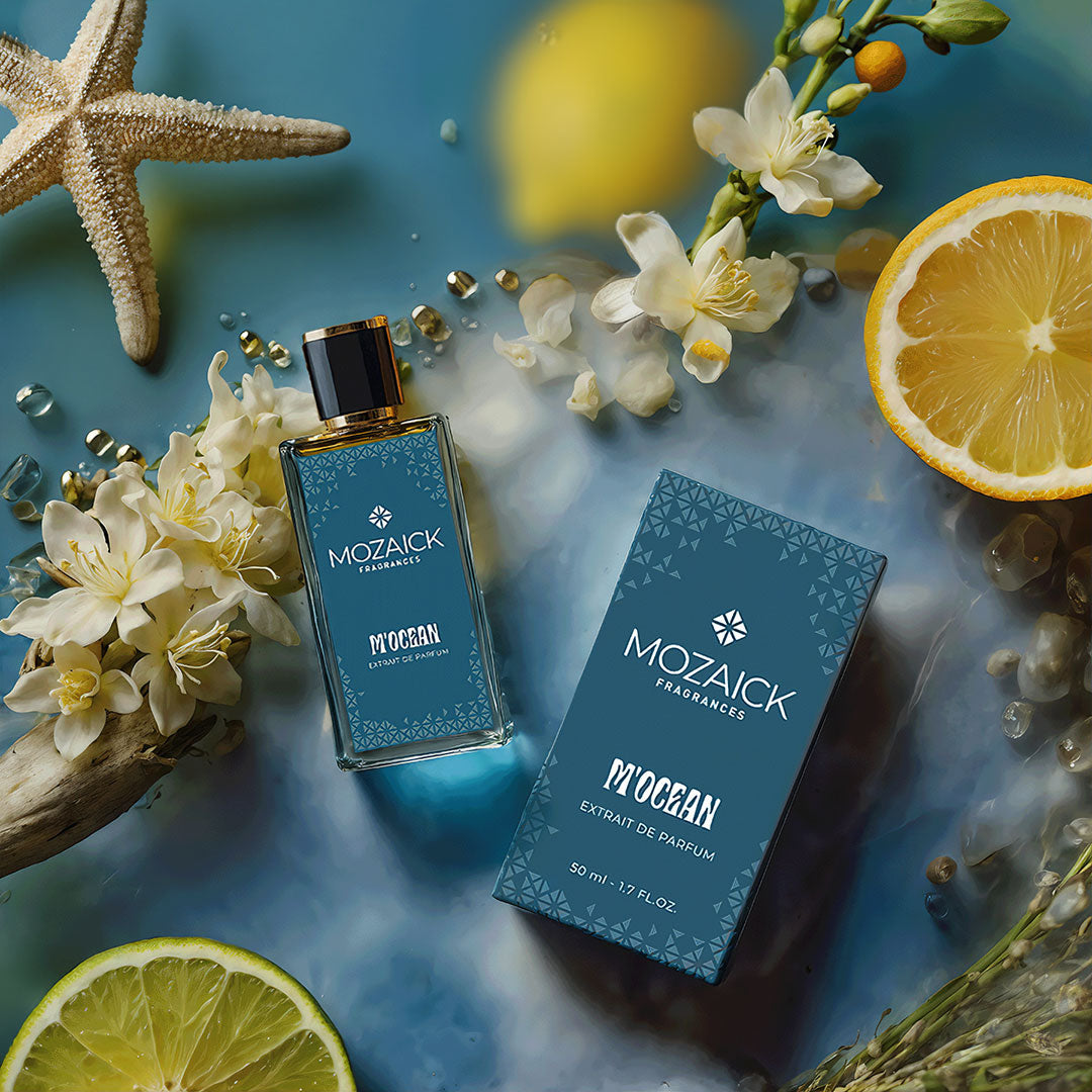 M'OCEAN Extrait de Parfum 50 ml by MOZAICK – bottle and box with lemons, white flowers and a starfish
